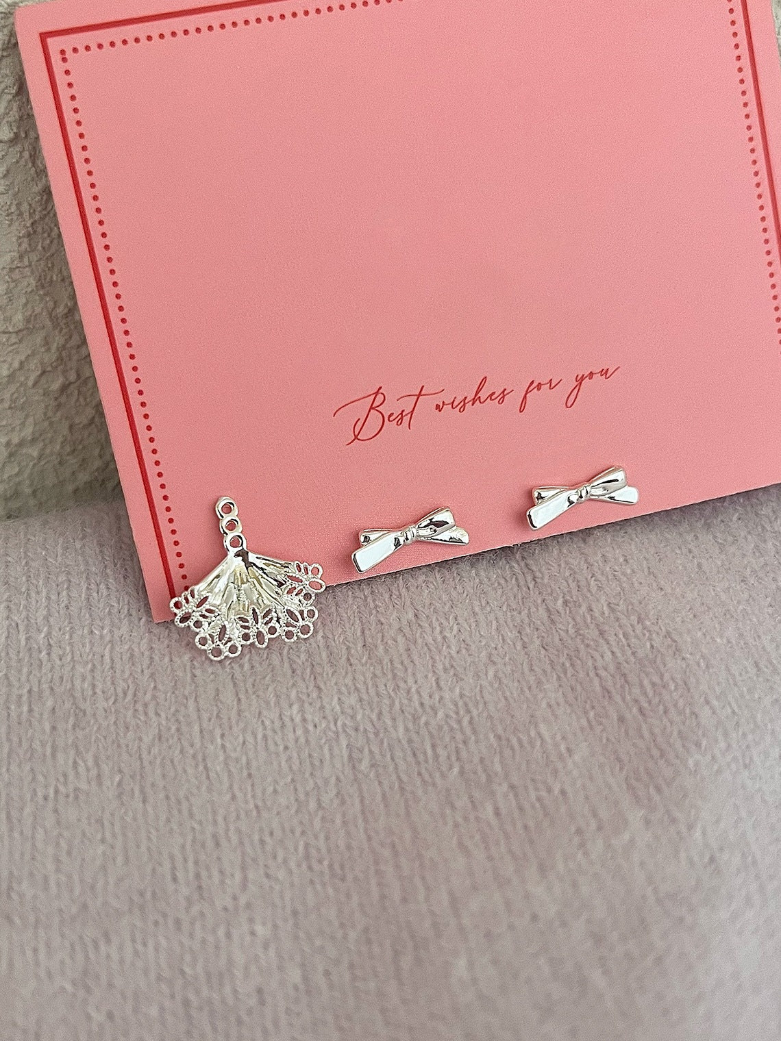 Suture Bow Tie Earrings