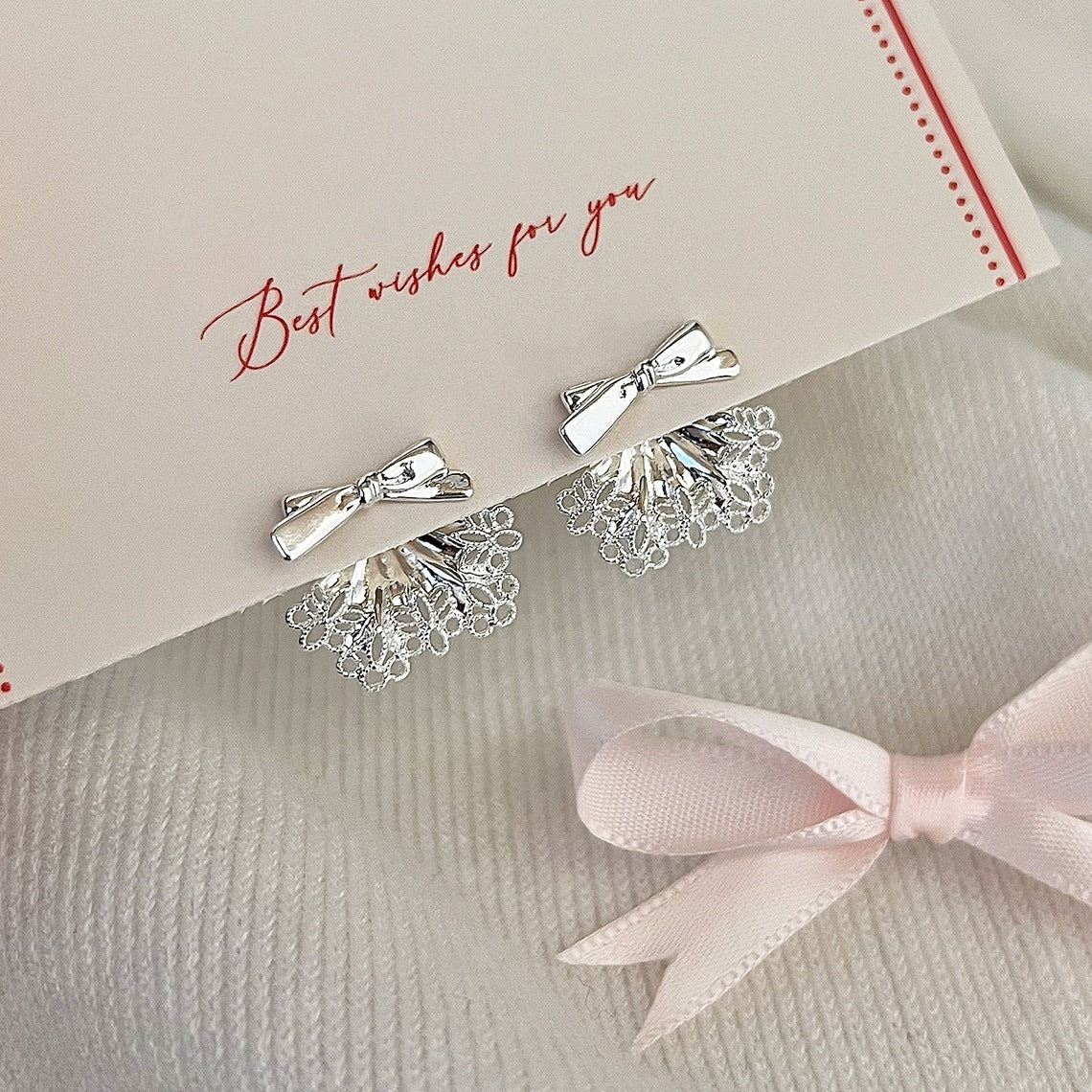 Suture Bow Tie Earrings