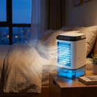 3-speed portable aircon in use on a bedside nightstand with cool mist and night light